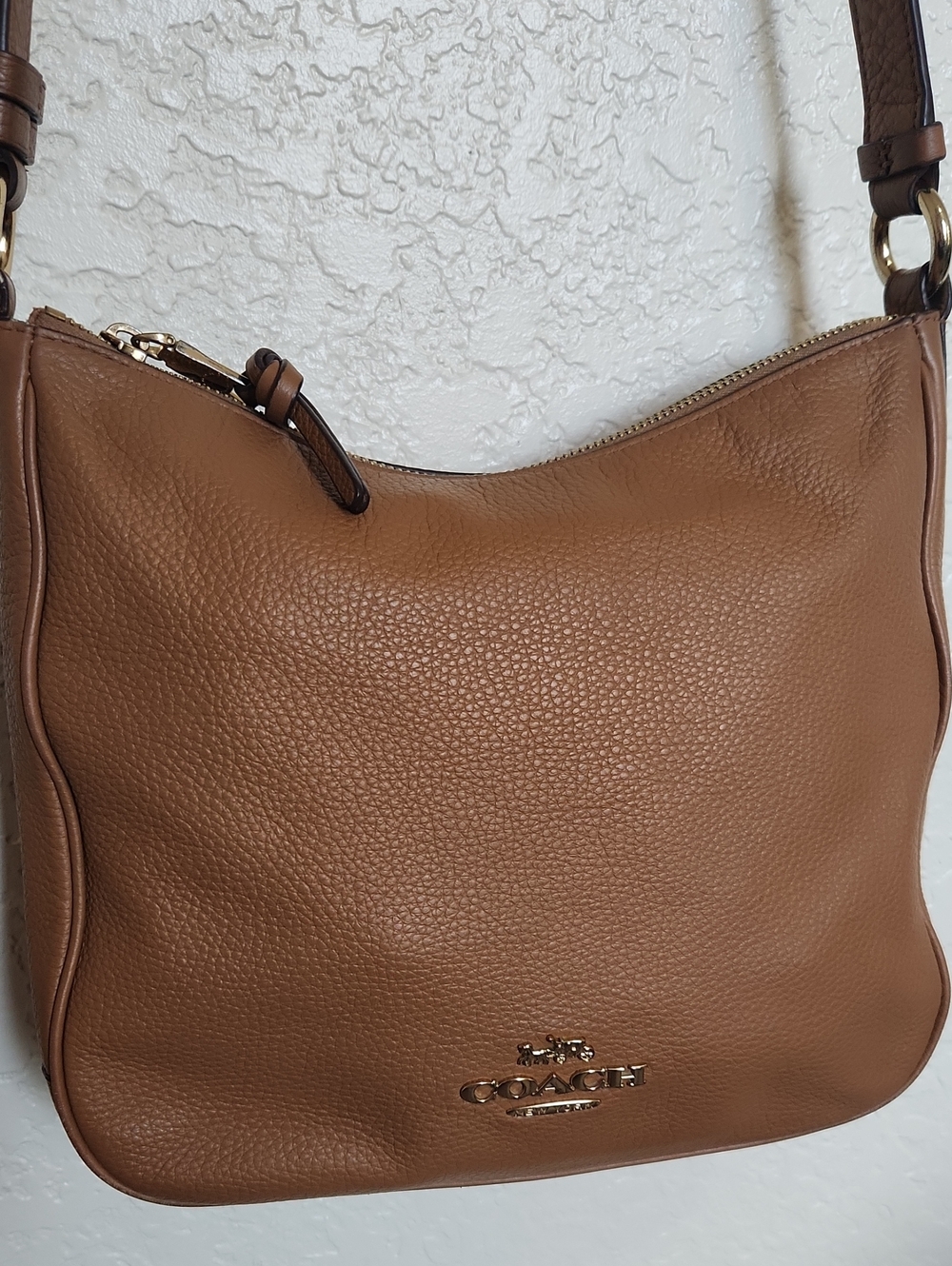 Coach Ellie File Bag in a classic brown/tan pebble leather finish